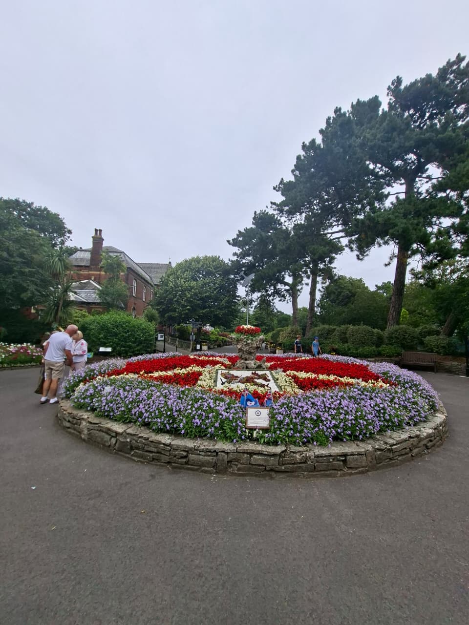 A view of an ornate raised flower bed at the entrance of the Southport Botanic Gardens.