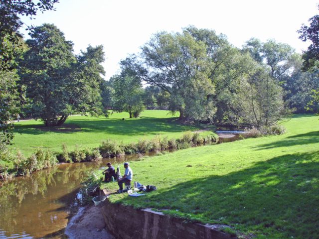 People fishing on the River Bollin
